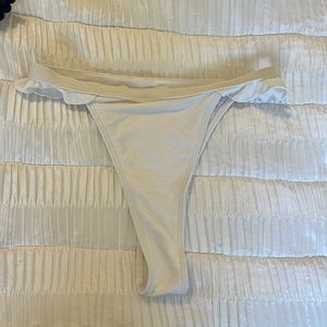 Women’s white ruffle thong, bikini bottom